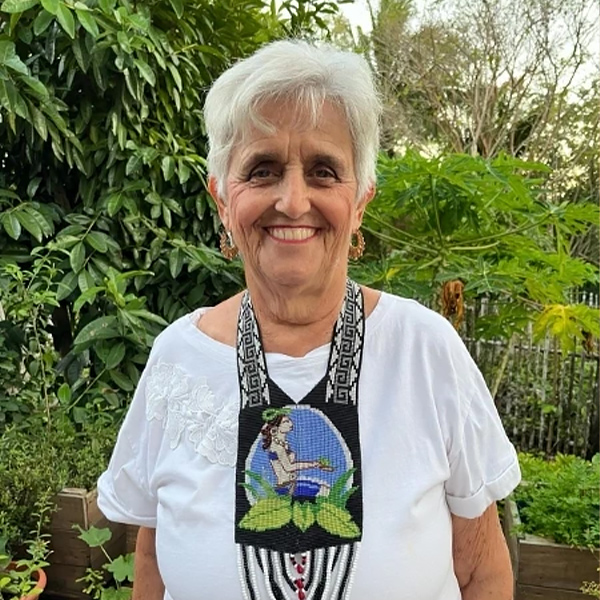 a woman smiling at the camera