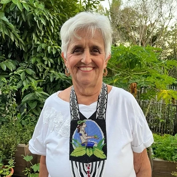 a woman smiling at the camera