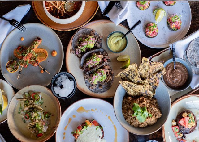 a table full of plates of food