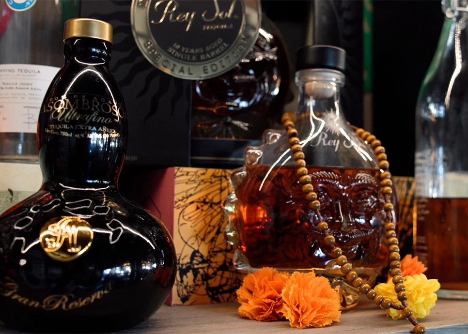 a group of bottles and flowers