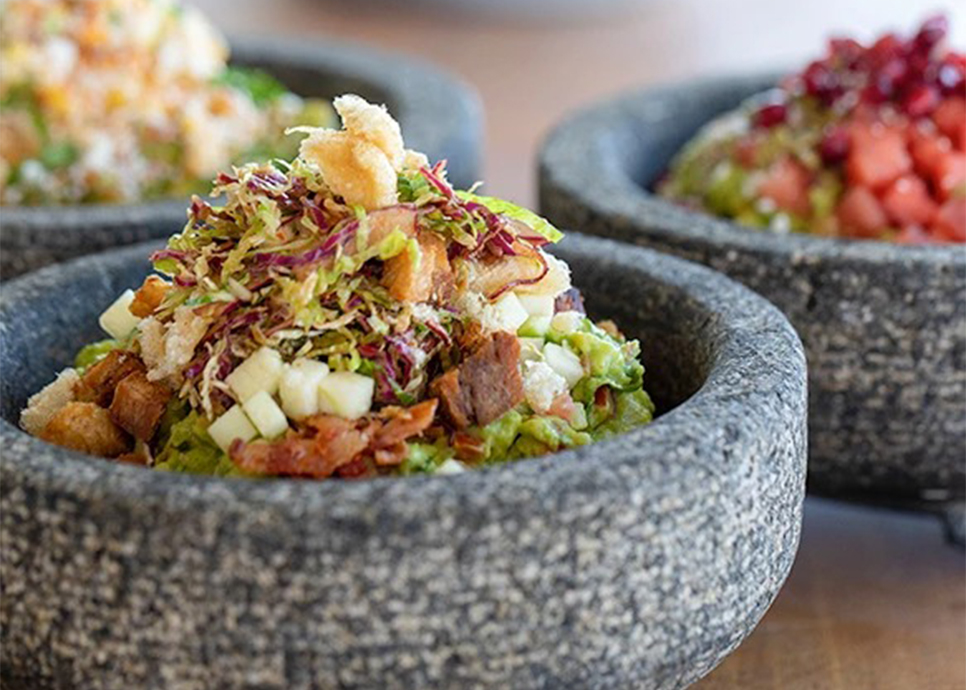 a group of bowls of food
