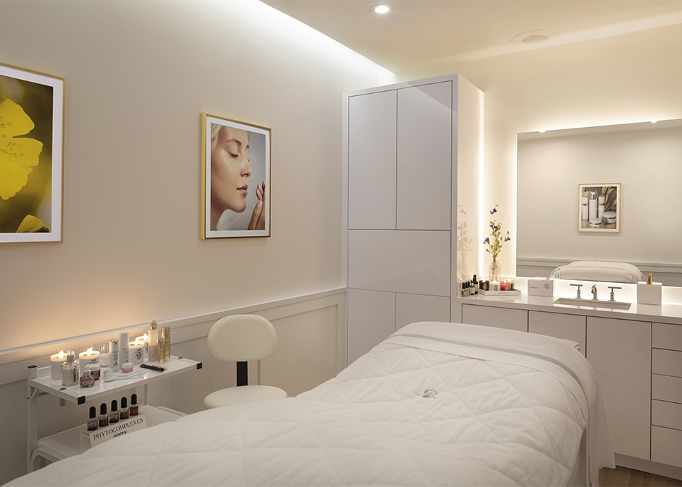 a room with a bed and a mirror