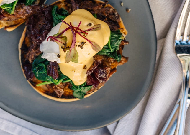 top view of a plate with hollandaise sauce on top