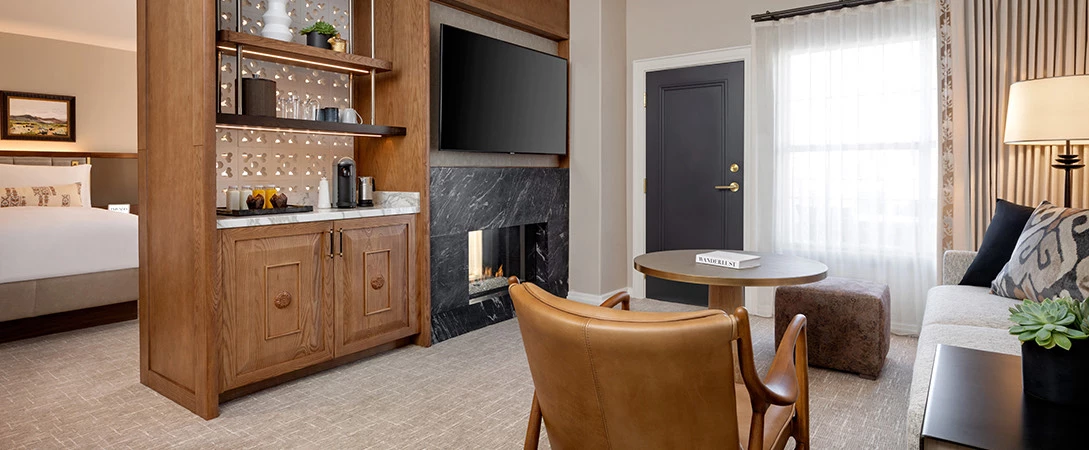 the privado studio lounge with a table and a sofa 