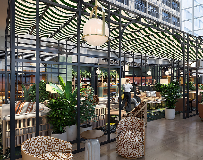 a room with chairs and a large window