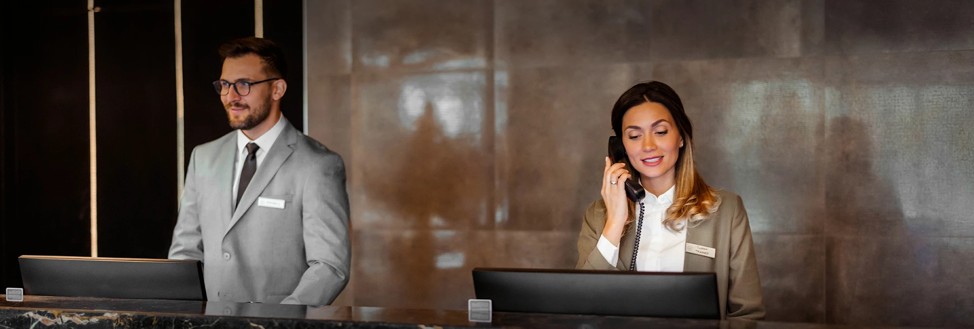 a man and a woman talking on the phone