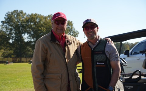 two men standing next to each other