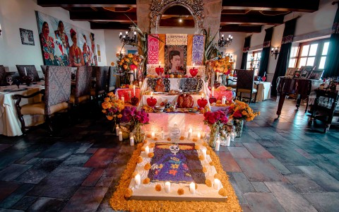 a altar with flowers and candles