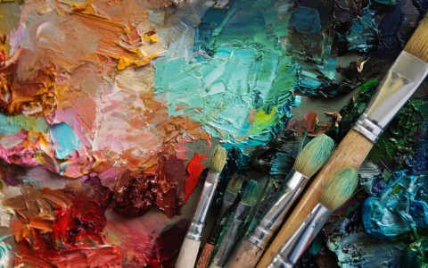 paint brushes on a palette