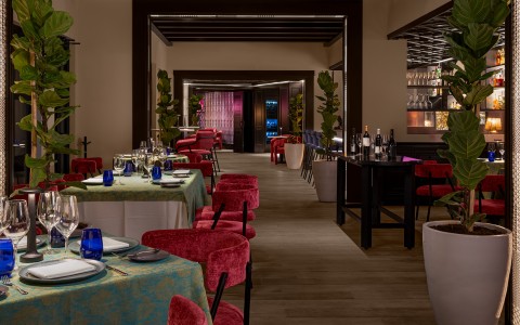 a restaurant with tables and chairs