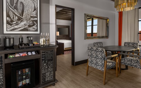 a room with a table and chairs