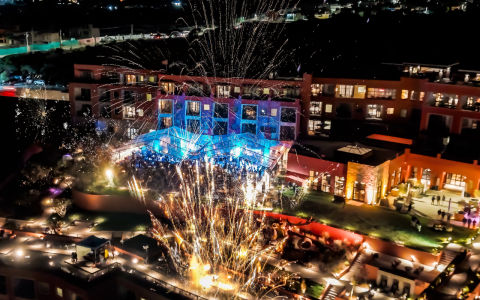 fireworks in the sky above a building