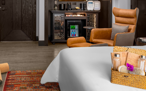 a room with a bed and a chair
