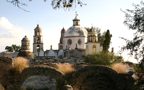 a white building with a domed roof