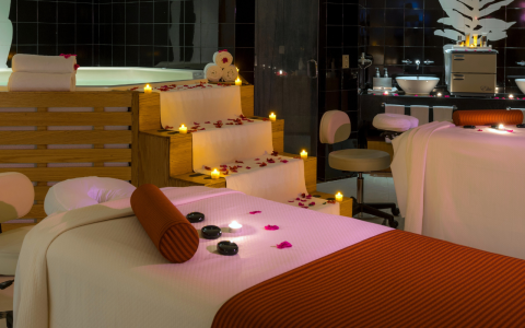 a bed with candles on it