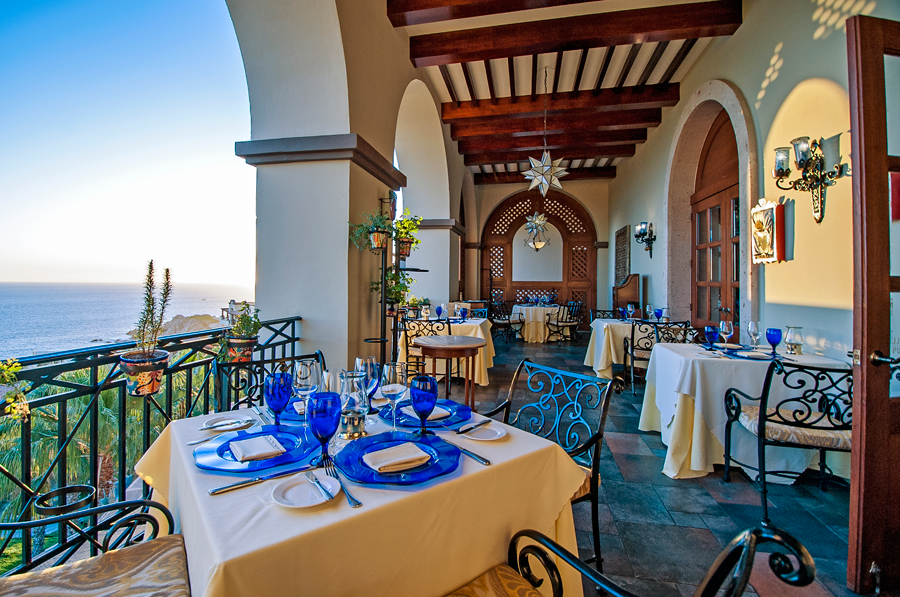 a restaurant with tables and chairs