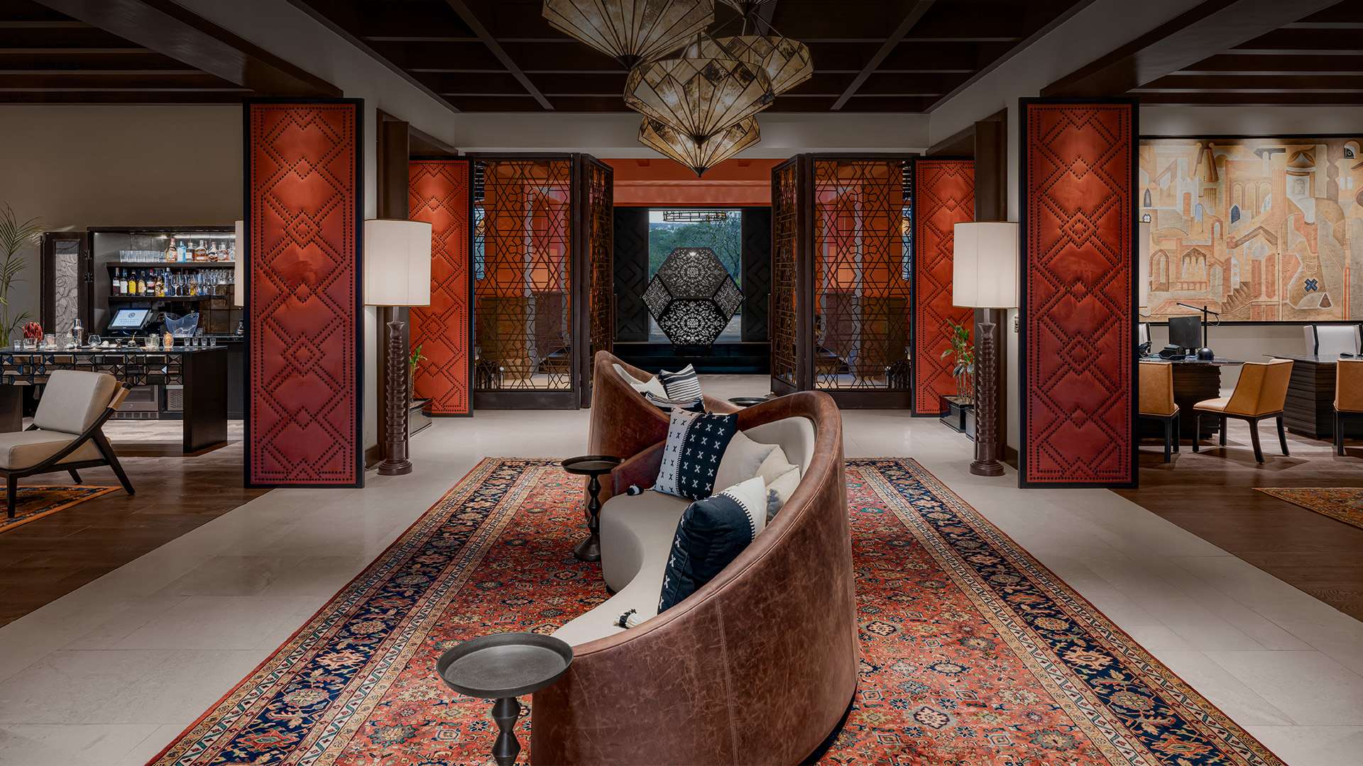 a room with a couch and a rug
