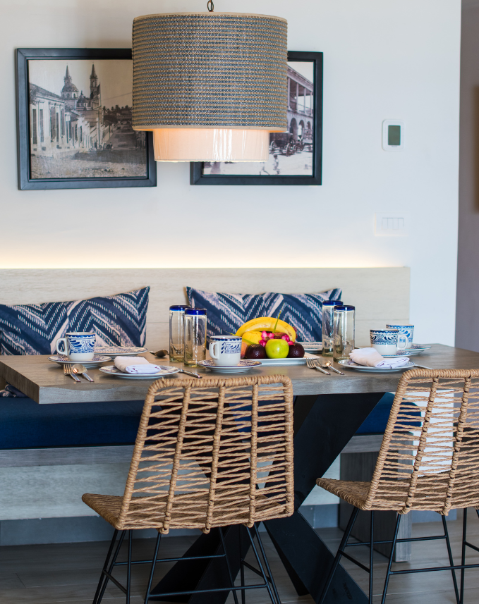 a table with plates and fruit on it