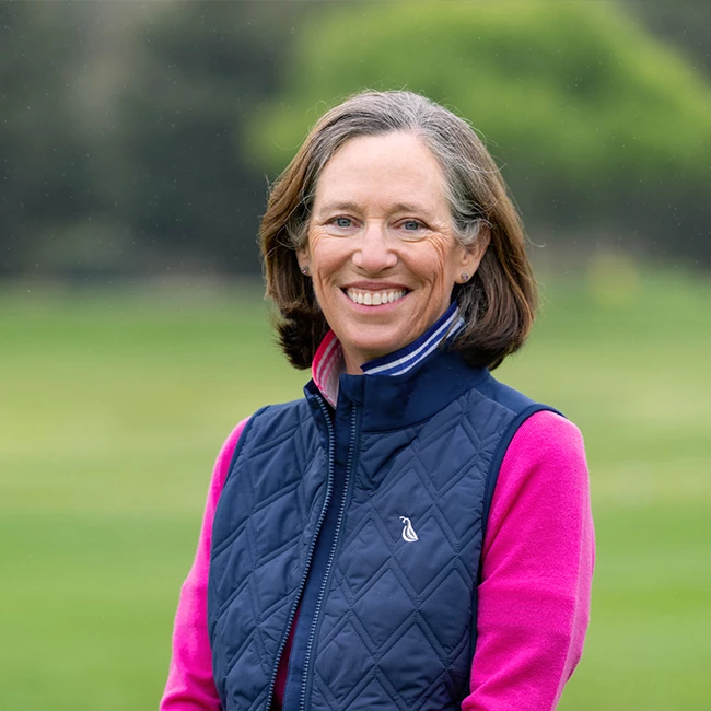a woman smiling at camera
