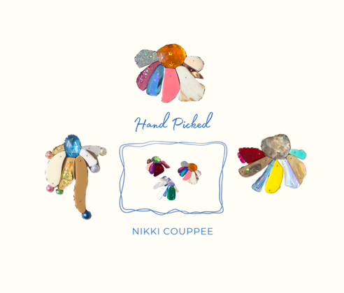 a group of colorful brooches