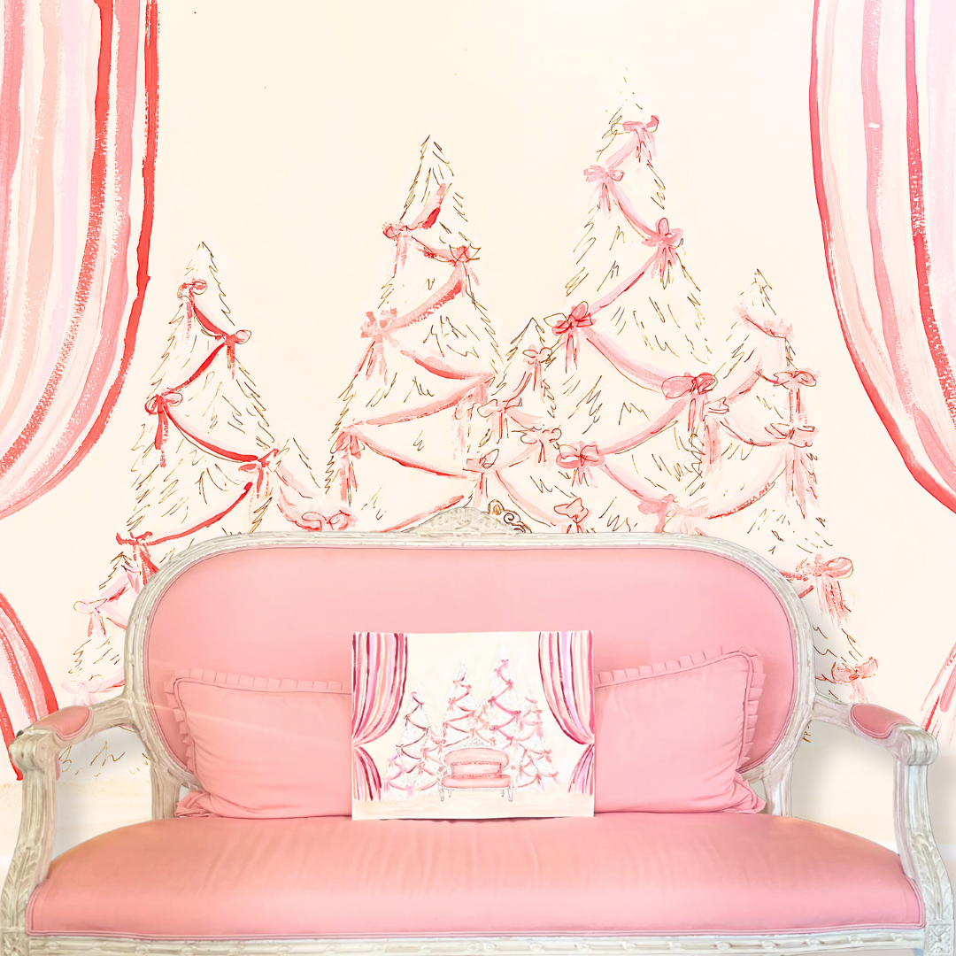 a pink couch with a pillow and a pillow on it