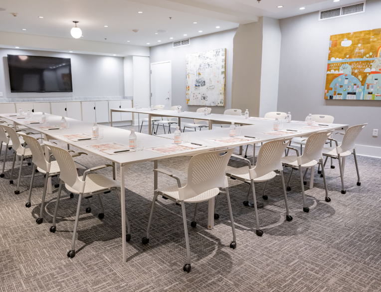 a room with a table and chairs