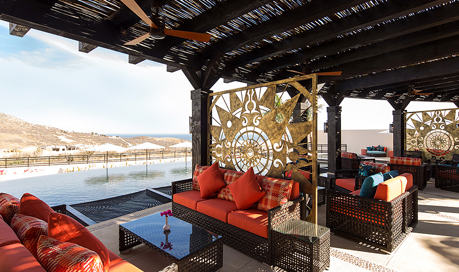 Shaded seating beside the pool at the Copala clubhouse