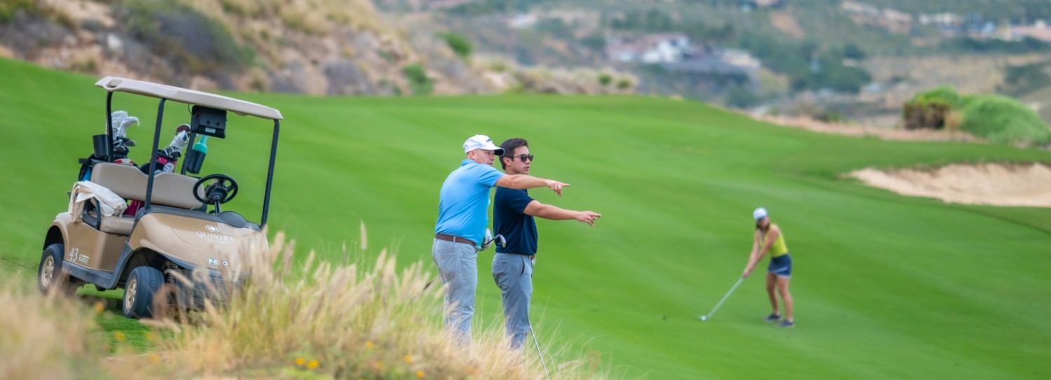 a group of people on a golf course