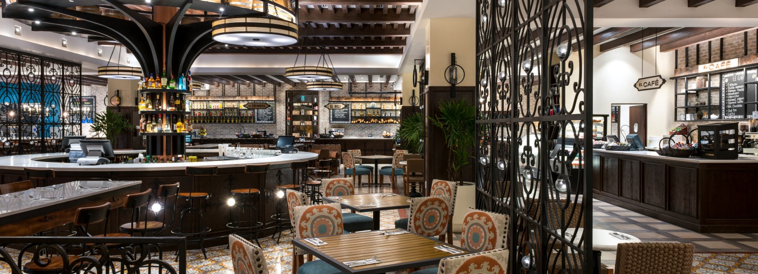 a restaurant with tables and chairs