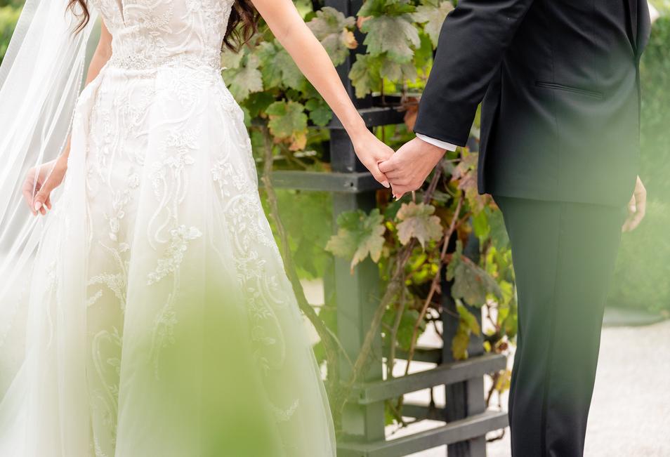 a man and woman holding hands
