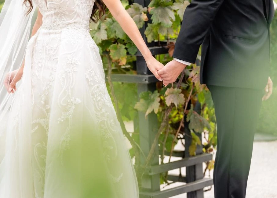 a man and woman holding hands