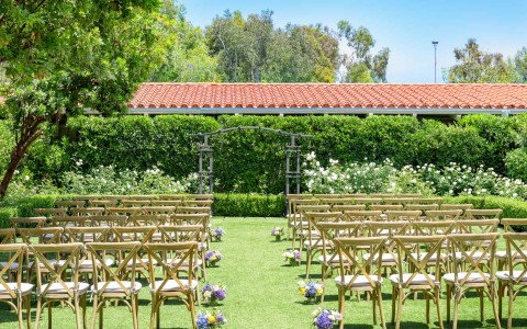 chairs in a lawn with flowers