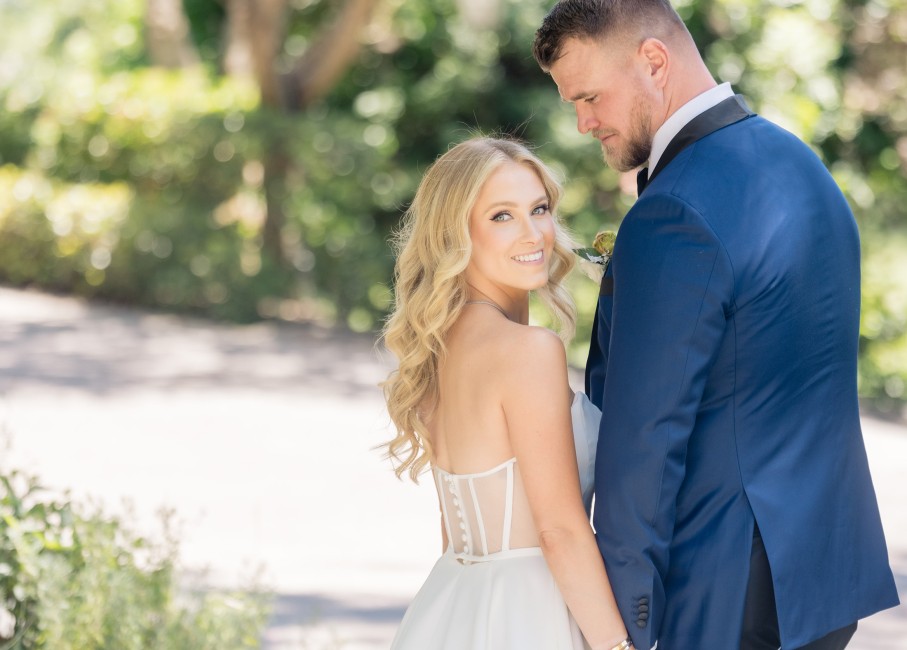 a man and woman in wedding attire