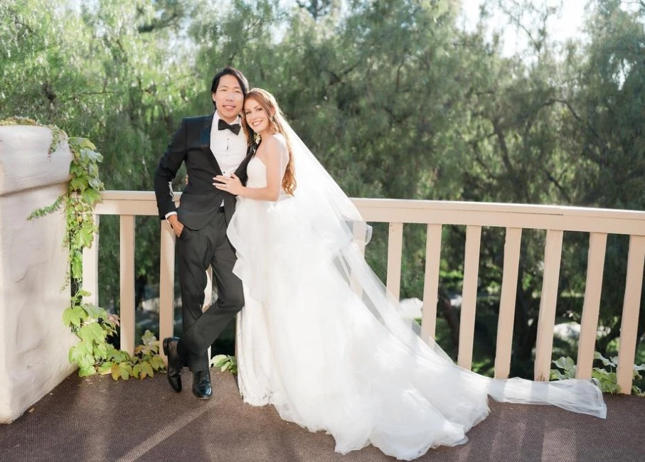 a man and woman posing for a picture