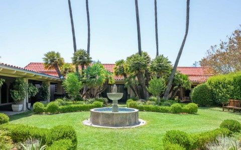 a fountain in a yard