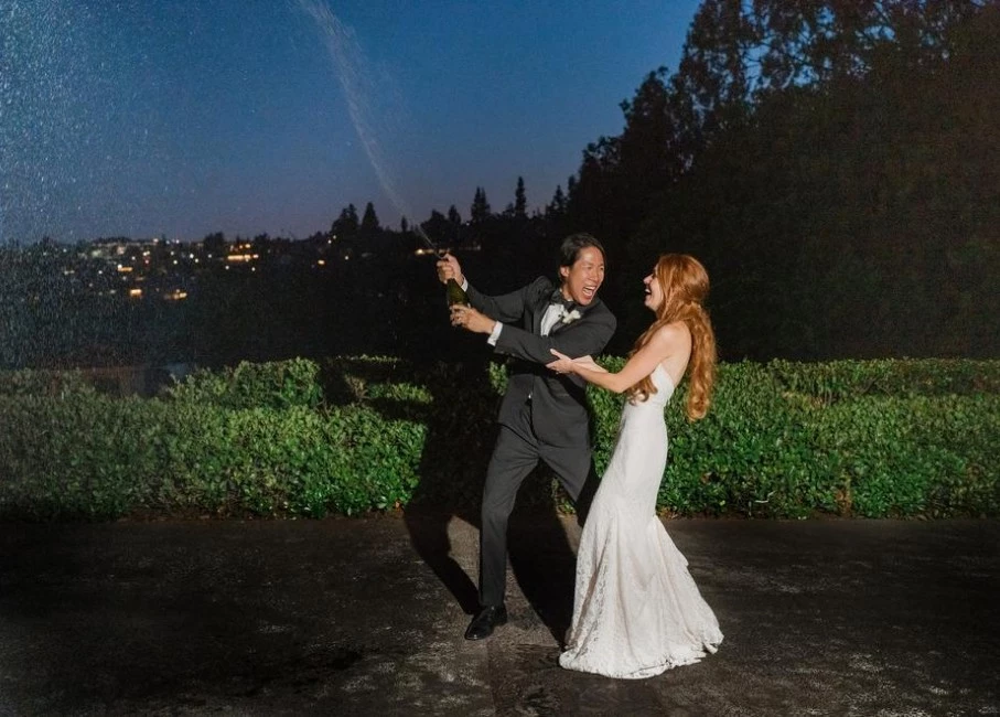 a man and woman in wedding attire
