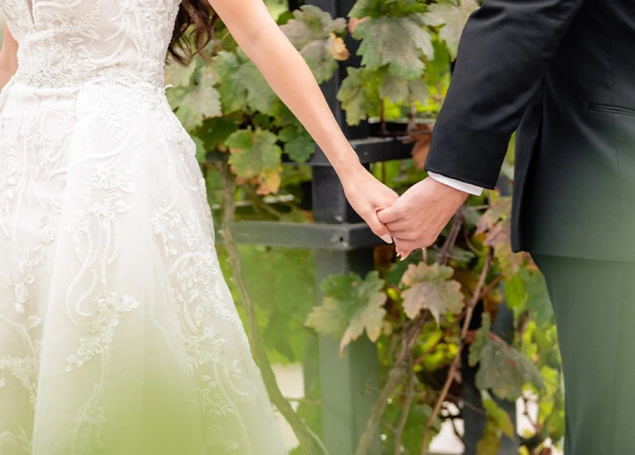 a man and woman holding hands