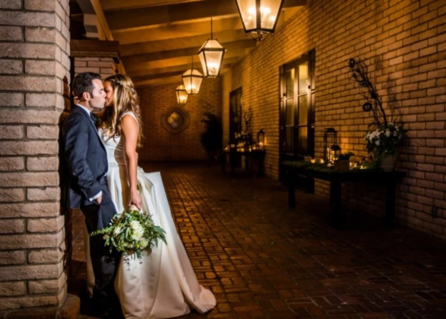 a man and woman kissing