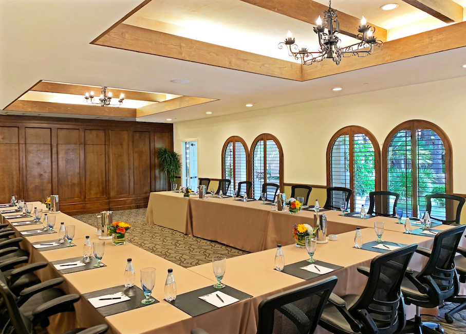 a large dining room with a large table set for a meal