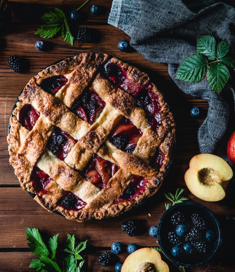 a pie with fruit on a table