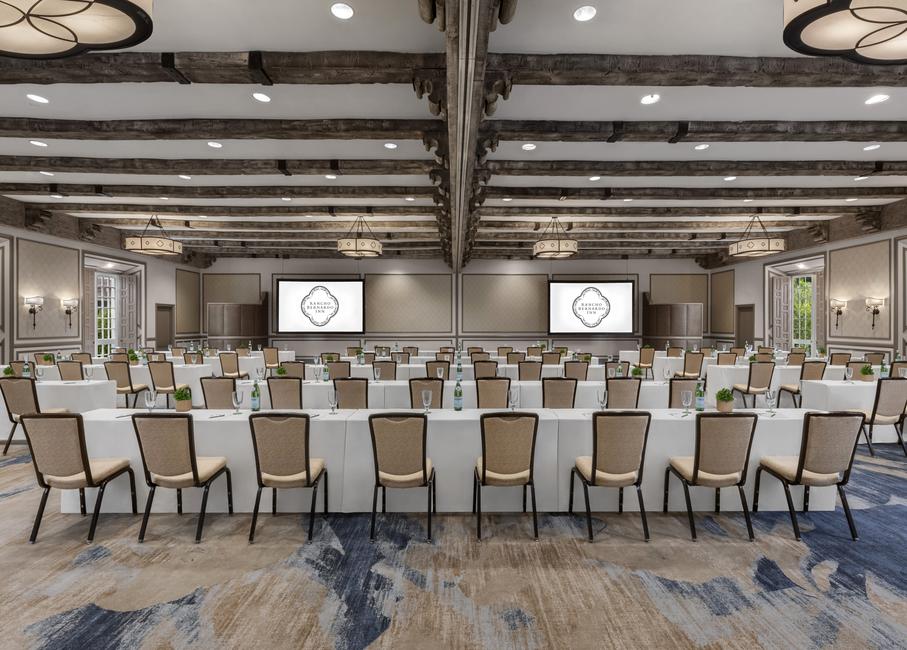 a room with tables and chairs