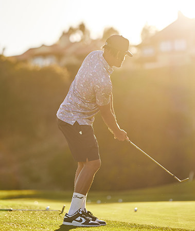 a person playing golf