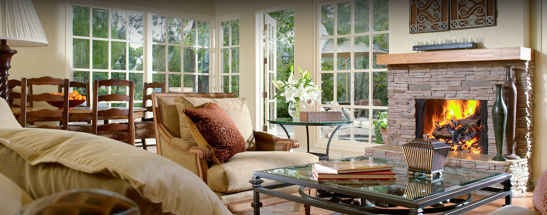 living room surrounded by windows