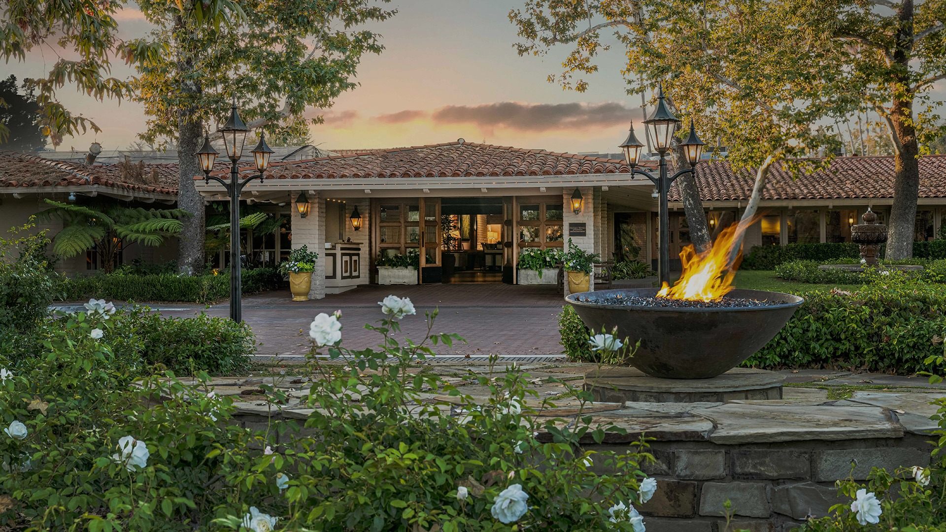 a fire pit in front of a building