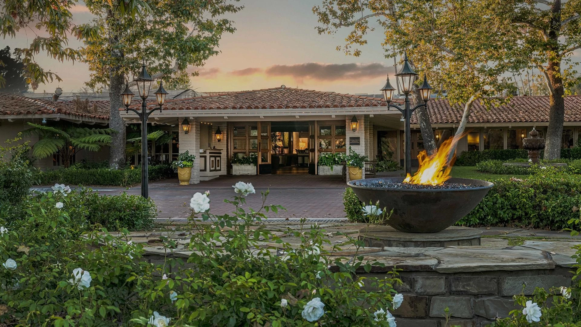a fire pit in front of a building