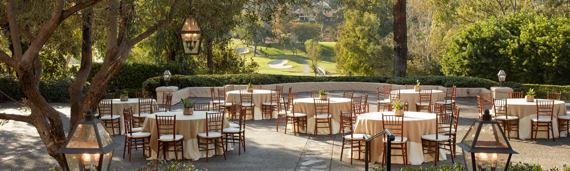 a group of tables and chairs outside