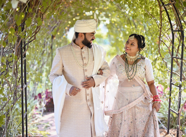 a man and woman in traditional indian attire