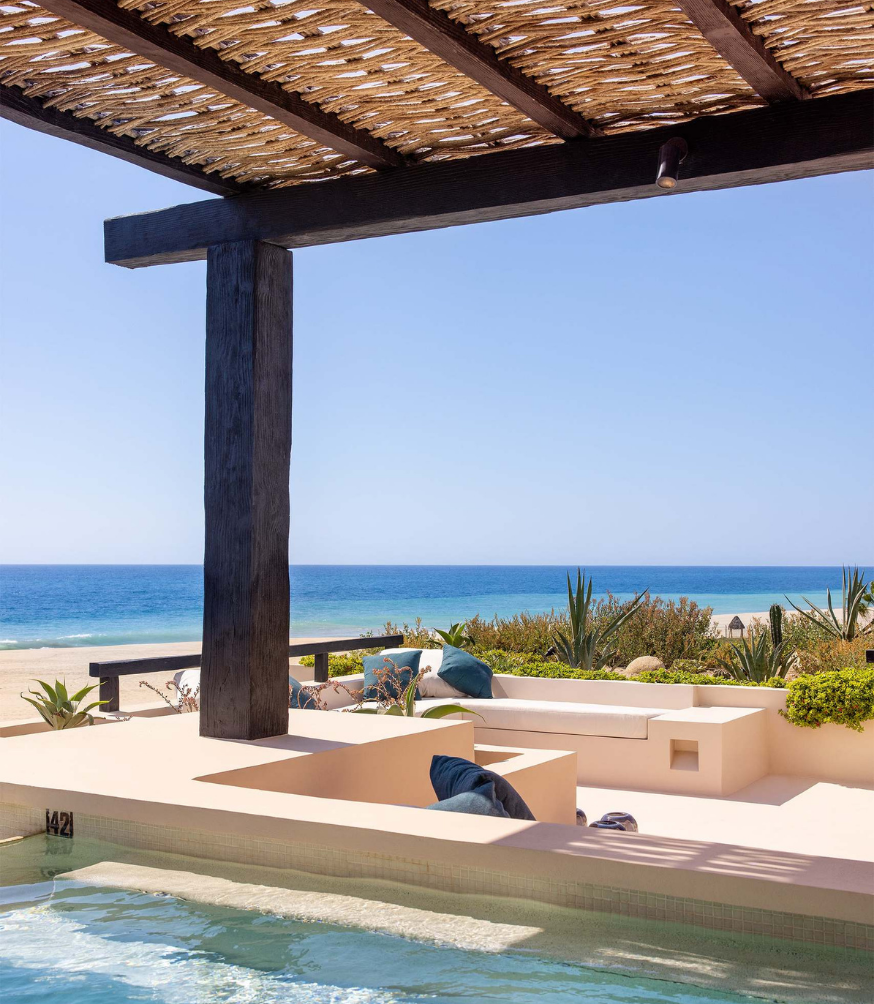 a pool with a beach view