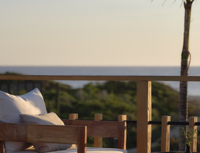 a chair and table on a deck