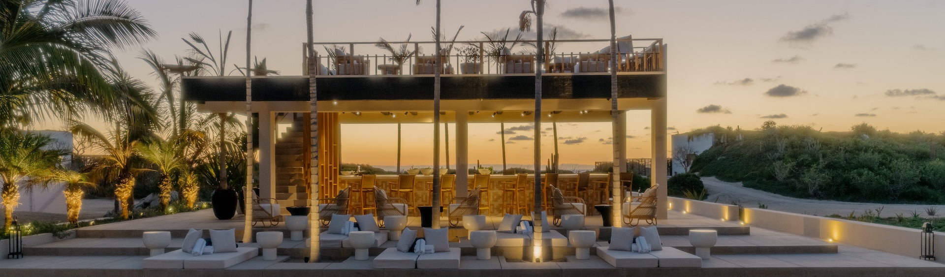 a building with a patio and chairs